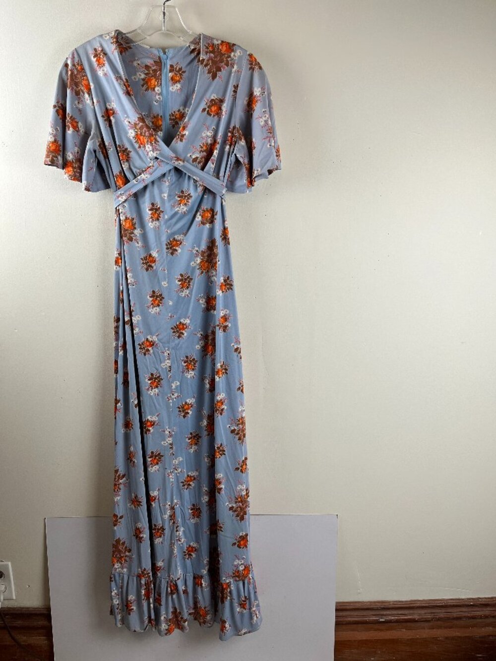 1970s Blue Floral Dress Features An Empire Wasst And Ruffled Hem